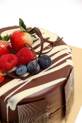  chocolate cake with strawberry topping.