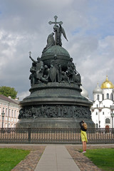 Girl photographed monument "Millennium of Russia" in Novgorod