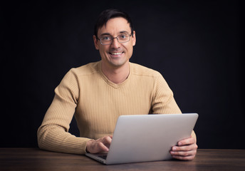 casual man with laptop