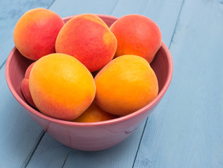 apricots on a blue board
