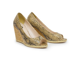 Biege high heel shoes isolated on white