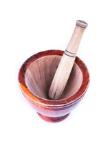 wooden mortar and pestle isolated on white background