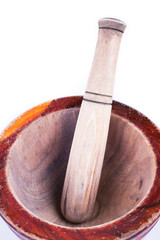 wooden mortar and pestle isolated on white background