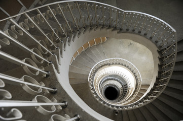 Spiral staircase in a building with many levels