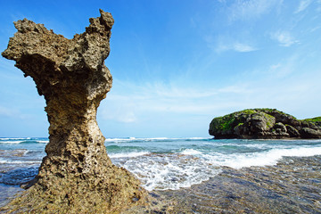Naklejka premium Nice rock and waves, Okinawa, Japan