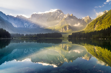 Fototapeta na wymiar Sunrise over the beautiful alpine lake