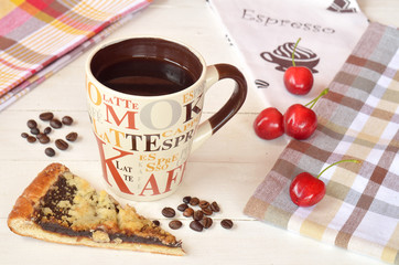 Ceramic mug of coffee on a white wooden table in Provence style