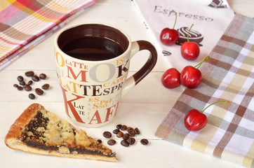 Ceramic mug of coffee on a white wooden table in Provence style
