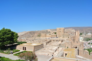 Fototapeta na wymiar Alcazaba of Almeria - a Moorish fortress built in the 11th century in the town of Almeria on the Andalusian coast, on a sunny summer day.