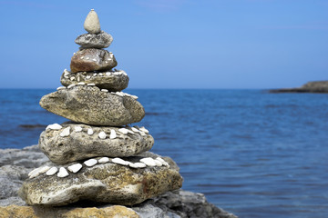 Fototapeta na wymiar Pyramid of sea stones