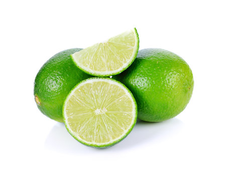 Limes with half isolated on white background
