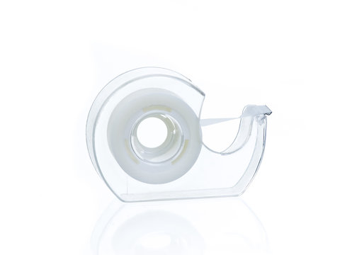 Clear tape dispenser isolated on white background