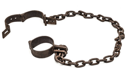 Old chains or shackles used for locking up prisoners or slaves between 1600 and 1800.