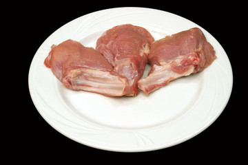 Meat on a white plate