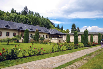 Interior garden of an old monastery in Romanian Moldavian Mountains