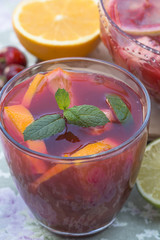 Refreshing red sangria with orange juice and fruit