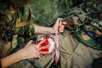 a military doctor to help the wounded soldier