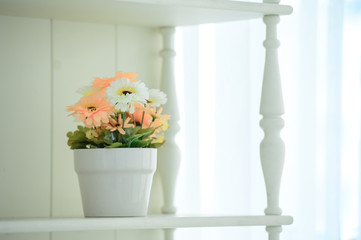 Artificial roses in the basket