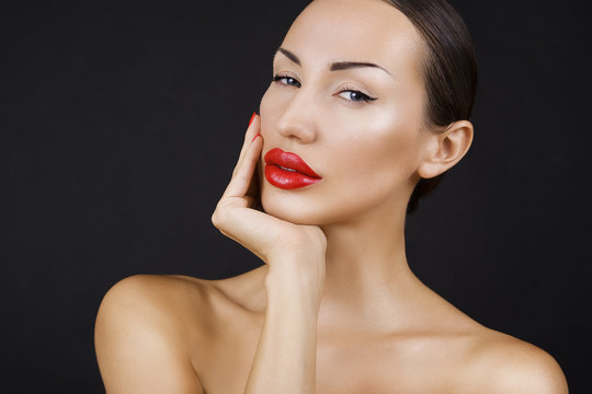 Beautiful Sexy Young Girl with Red Lips, Bright Make-up on Dark