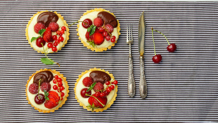 tartlets with custard and berries