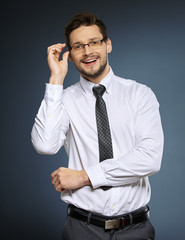 Business man wearing glasses looking to the side