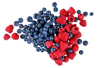 Fresh Organic  Blueberries and Raspberries.  Rich with vitamins. Isolated on white background