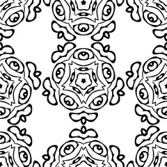 Seamless background made of exotic pattern in black and white co