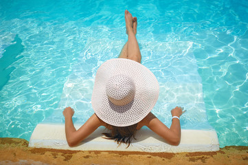 beautiful woman in a white hat