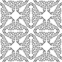 Seamless background made of exotic pattern in black and white co