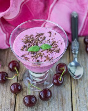 Smoothies. Dairy dessert with cherries and chocolate. Selective