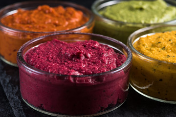organic vegetable vibrant dip selection, food background