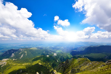Sunlight over the mountain ridge
