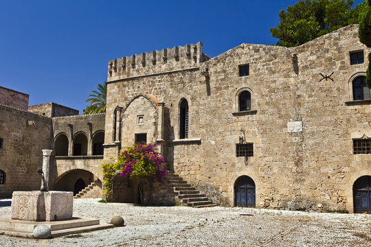 Medieval buildings at the Argirokastrou Square in the old town of Rhodes, Greece.