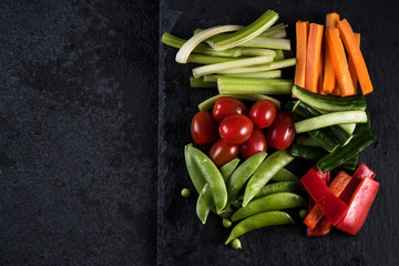 Fresh organic vegetables and vibrant dip selection