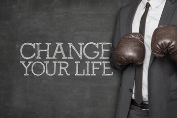 Change your life on blackboard with businessman 