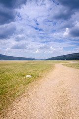 Landscape of mountain sky and cloud dry field