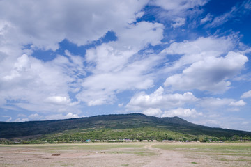 Landscape of mountain sky and cloud dry field