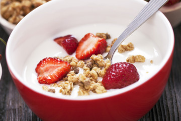 Excellent breakfast. Breakfast cereal with yoghurt and strawberr