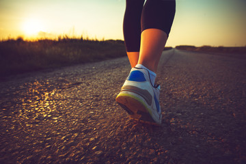 Woman's athletic legs .Close up image of sneakers.Jogging.