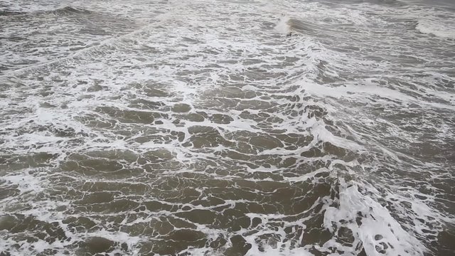 Stormy sea water with foam and waves, HF footage 