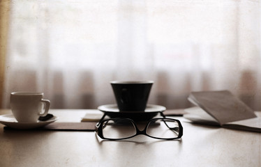 Artwork in retro style,  cup of coffee, glasses