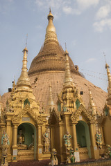 Naklejka premium The Great Stupa of the Shwedagon Pagoda is covered in gold leaf which must be restore or replaced every five years or so.Yangon,Myanmar