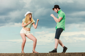 hipster couple in love playing fighting outdoor