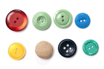 Set of colored buttons on white background