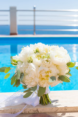 bridal bouquet of white peonies