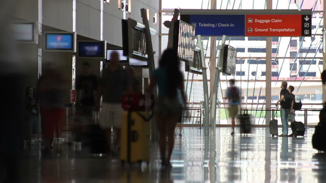 Airport People Time Lapse – Time Lapse of people with luggage, walking and checking in at an airport