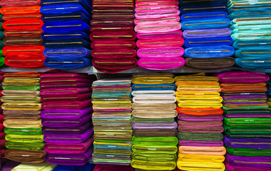 Pile of cloth fabrics at a local market in Bangladesh.