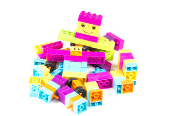 Toy colorful plastic blocks isolated on white background   © sakdinon