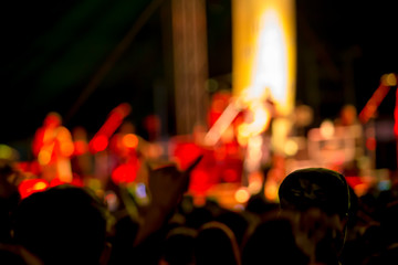 silhouette concert in front of stage