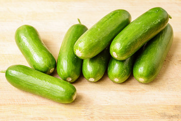 cucumbers on the wooden board